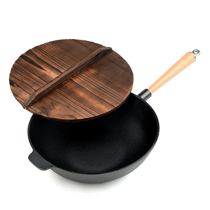 Wok en fonte pr&eacute;-enduite &agrave; une poign&eacute;e de 31&nbsp;cm