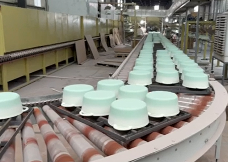 Ligne de production de cocottes en fonte &eacute;maill&eacute;e